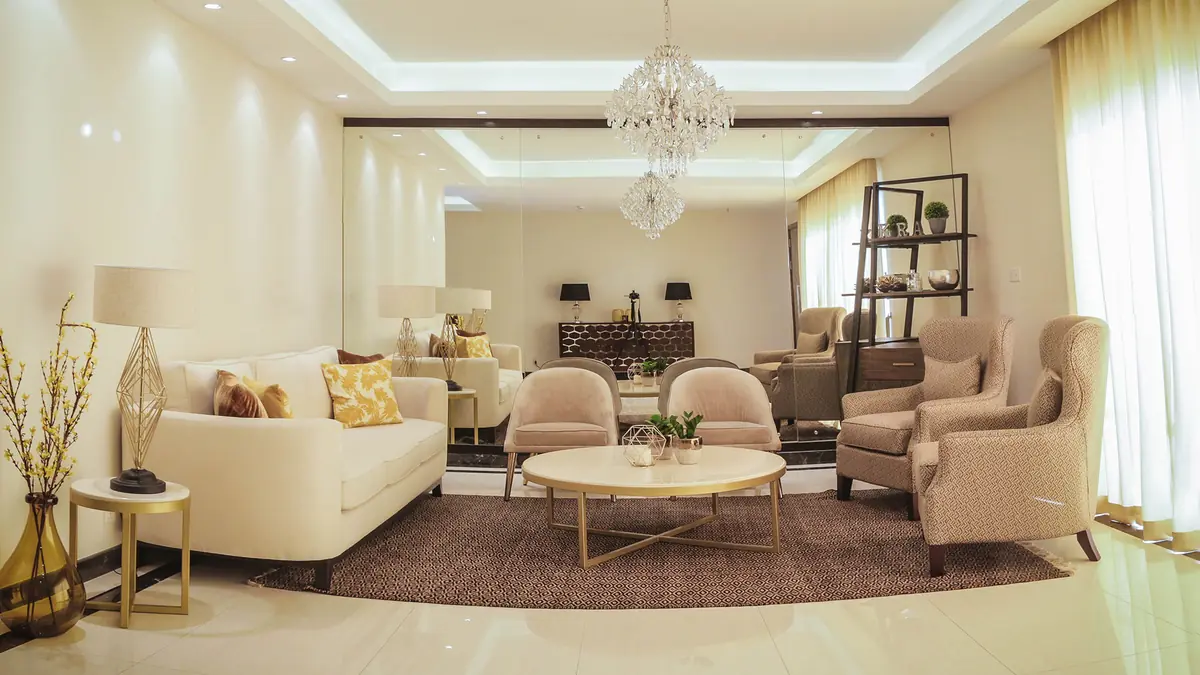 Bright living room with glass doors and furniture, interior photography
